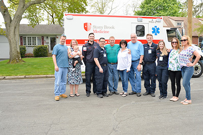 First Stony Brook Mobile Stroke Unit patient with family and EMS