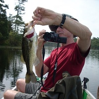 Photo of Dr Shaw on boat